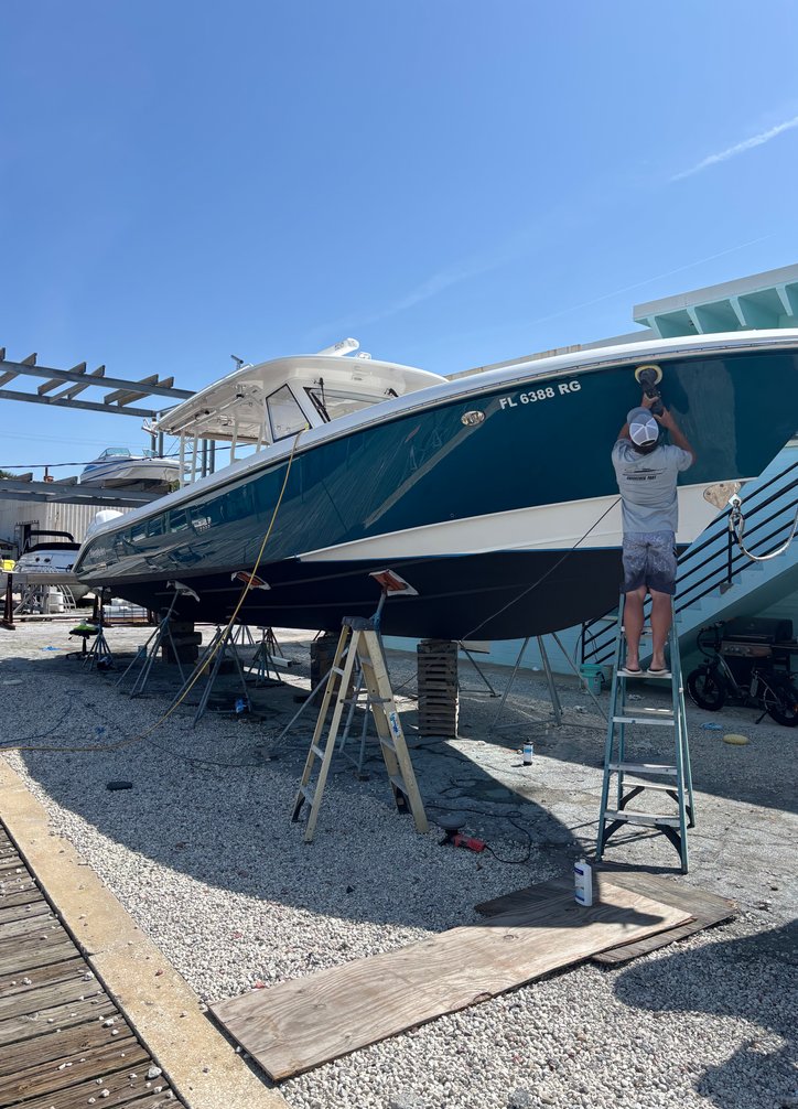 Working on boat outside